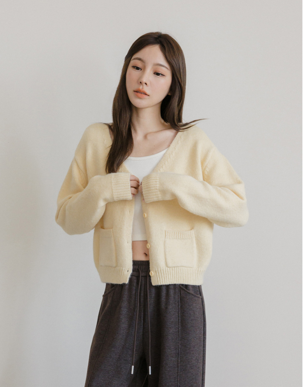 雙口袋V領針織上衣