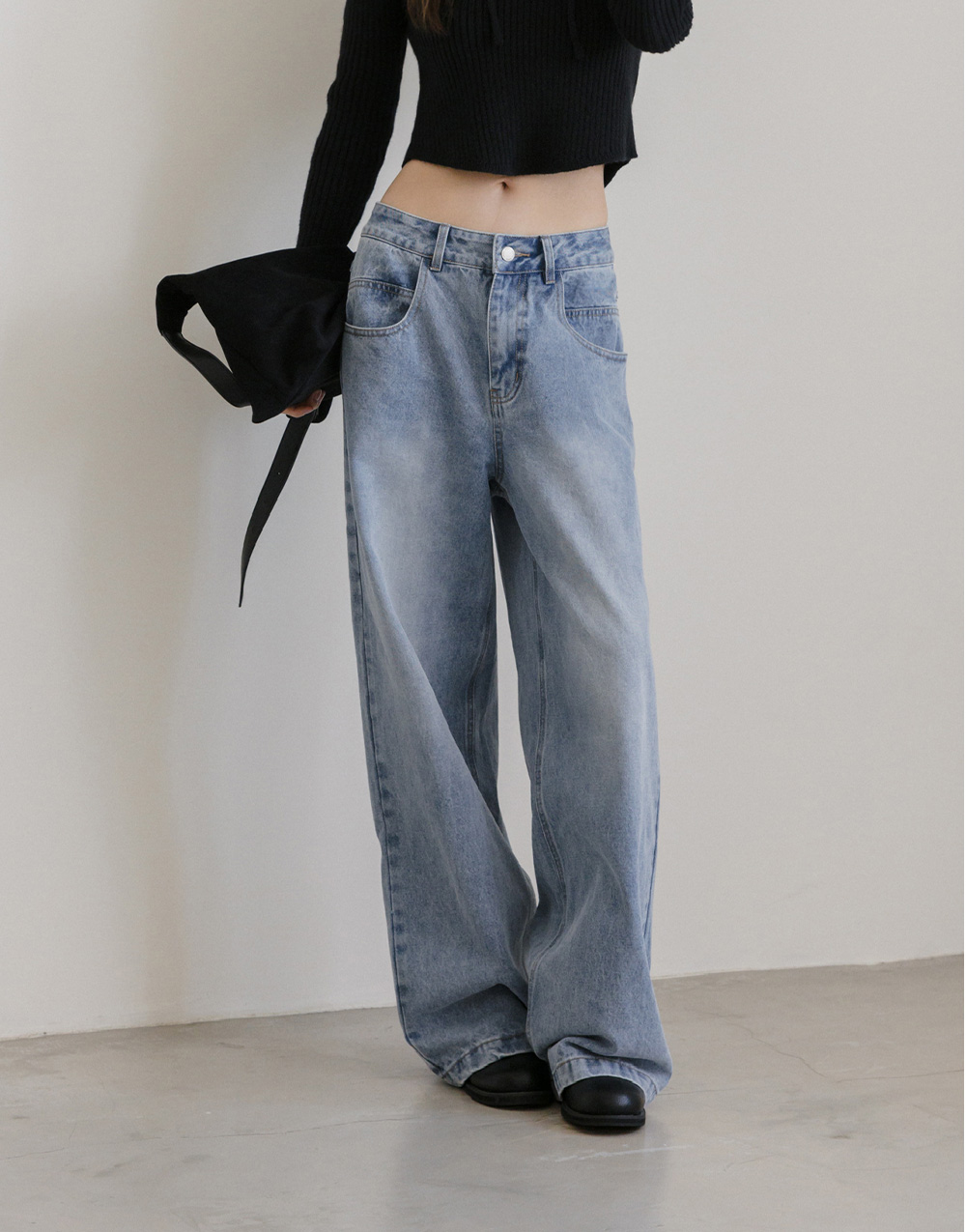 口袋剪裁水洗牛仔褲