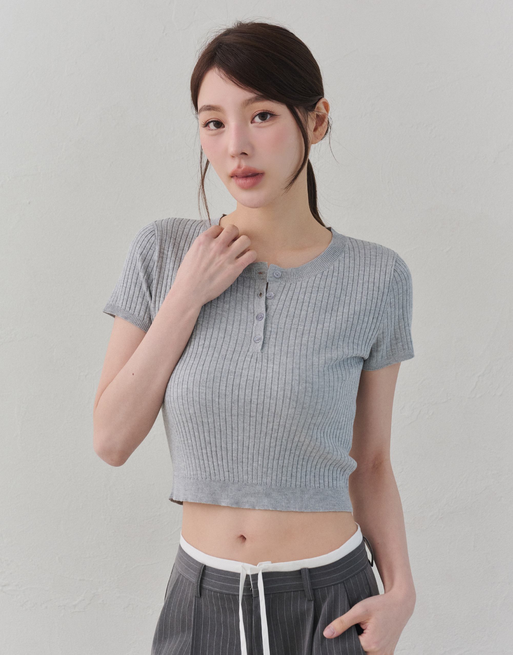 坑條半開襟針織上衣