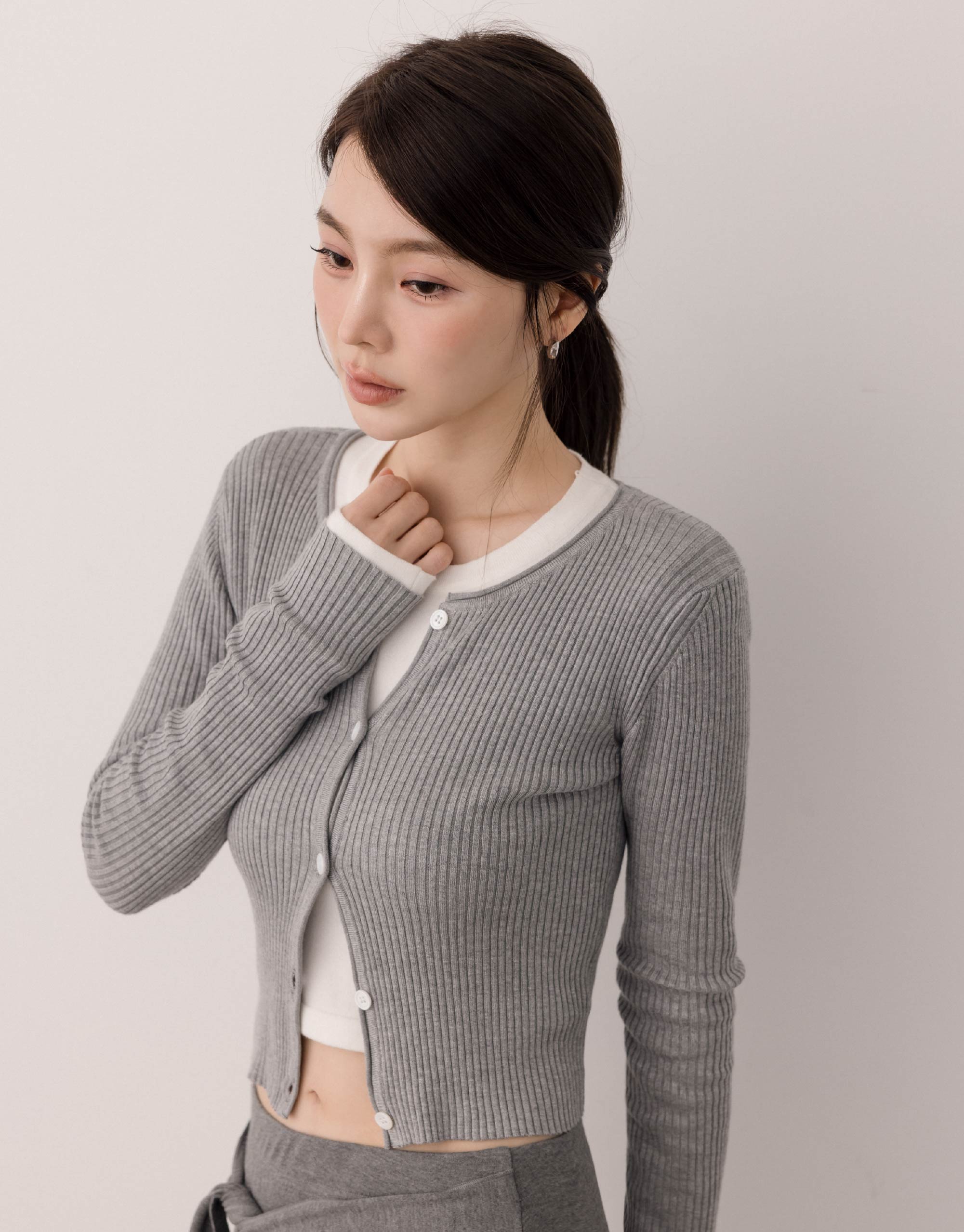 排釦圓領坑條針織小外套