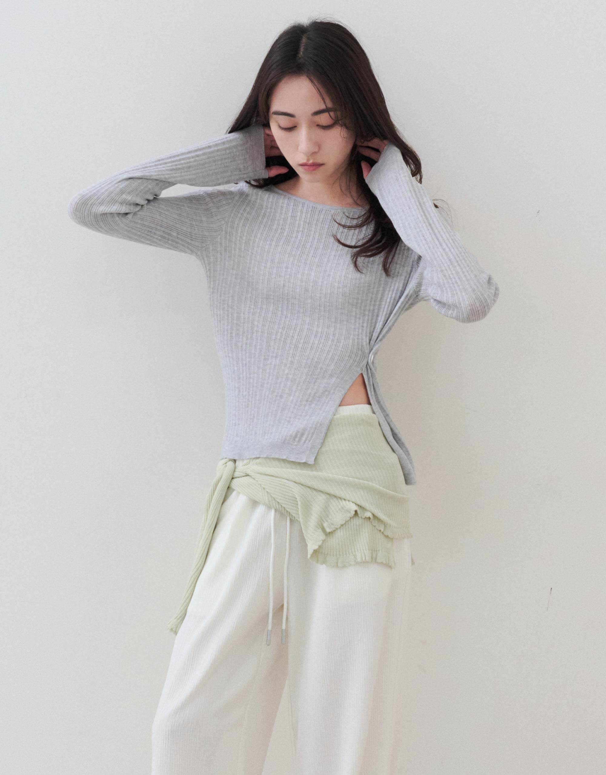 微透坑條側開衩針織上衣